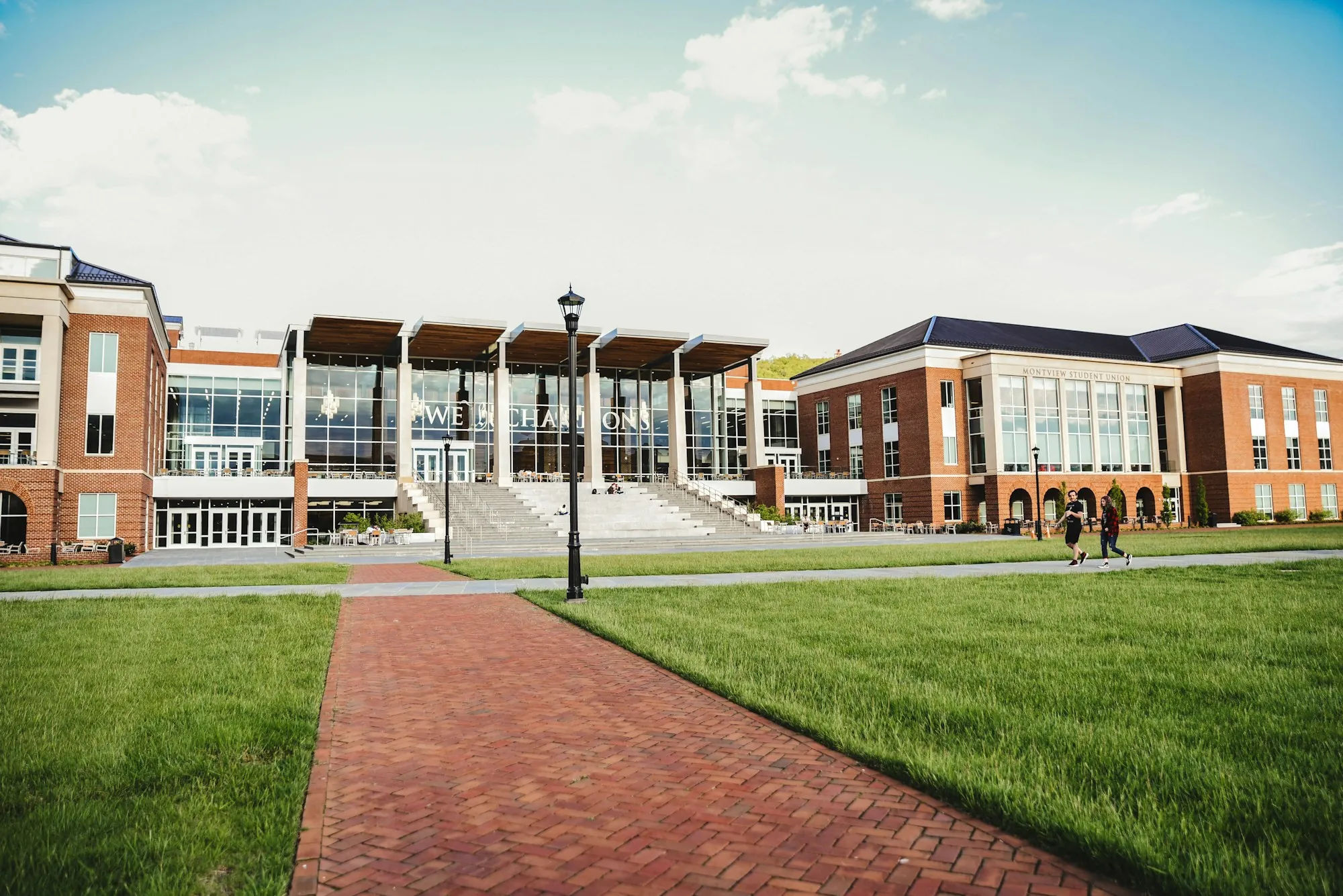 Brick campus buildings and a walkway